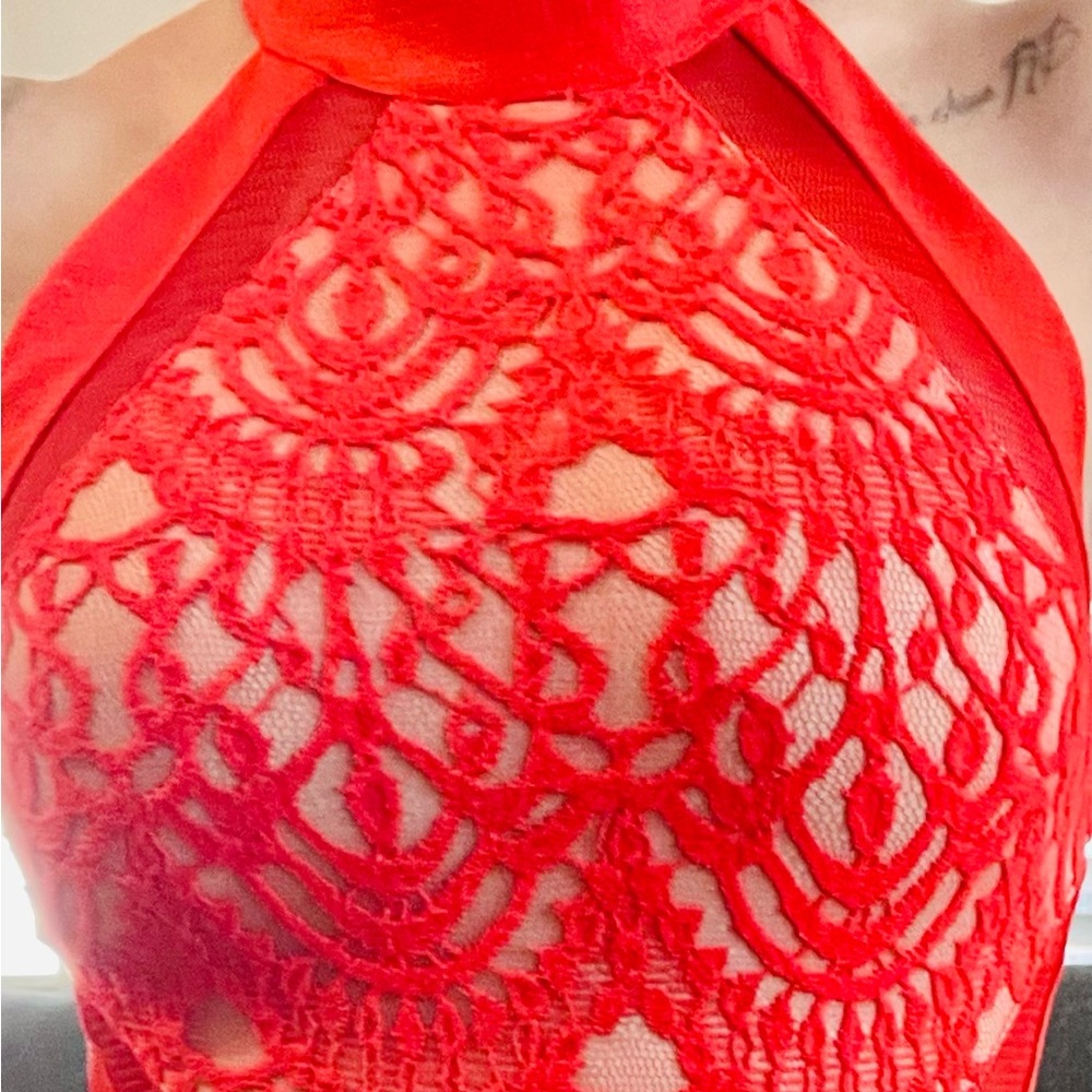 A Angel Biba red-orange Asymmetrical unique dress.